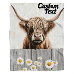 Rustic daisy fence Highland cow throw blanket view 2 styled on living room couch in farmhouse home