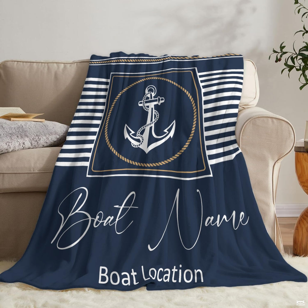 Overhead presentation of maritime anchor visual artwork and twisted rope detailing on bedding.