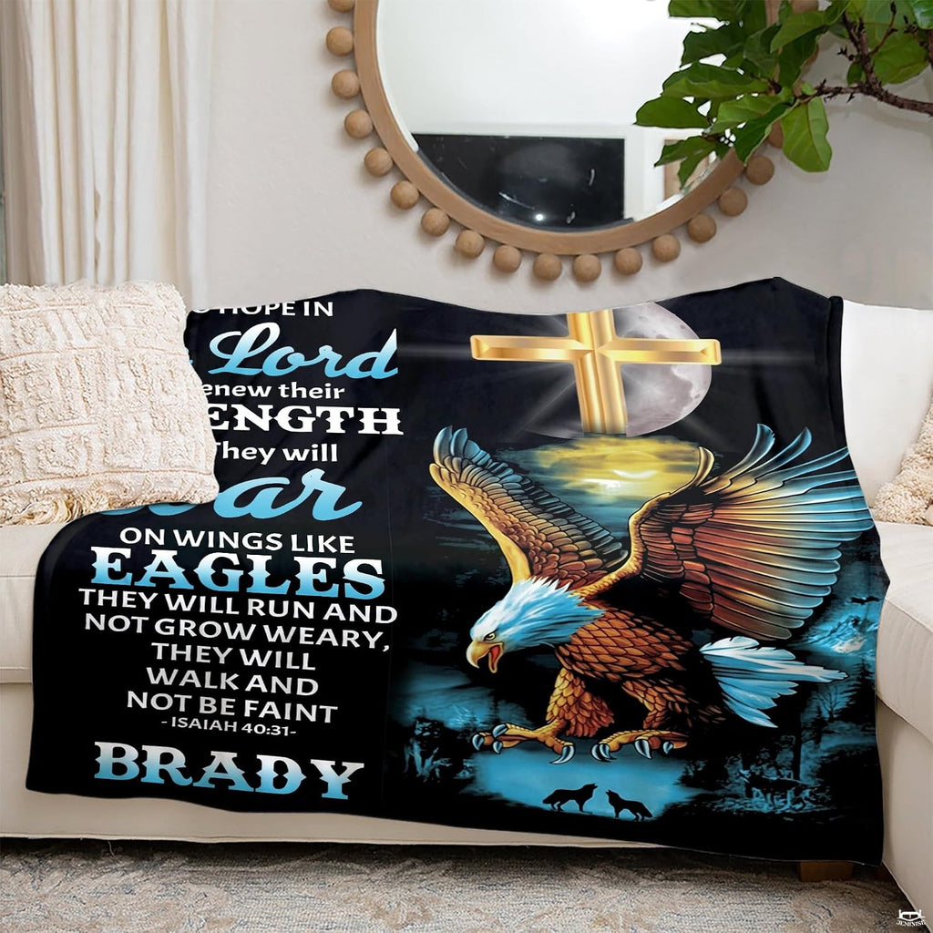 Decorative throw blanket draped over indoor living room seating showcasing night forest artwork.