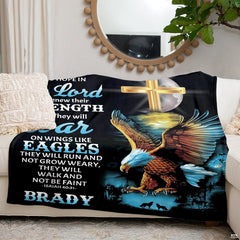 Decorative throw blanket draped over indoor living room seating showcasing night forest artwork.