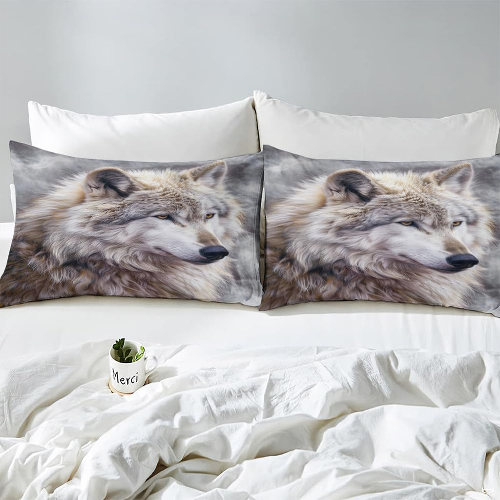 Close view of matching pillows with pale wolf portraits on misty gray