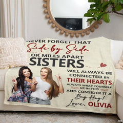 Sentimental family portrait design blanket arranged gracefully on a living room couch.