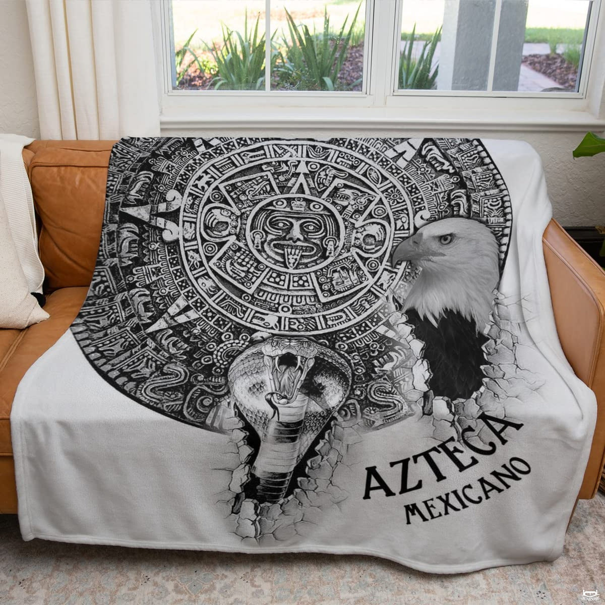 Flat view of Mexican heritage blanket featuring carved Aztec Sun Stone, eagle, and snake