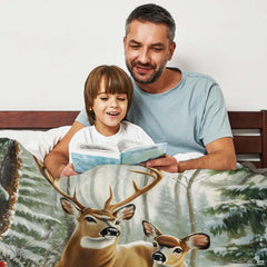 Spotted fawn and majestic buck standing in deep snow with vibrant red winter berry accents across the bedding design.
