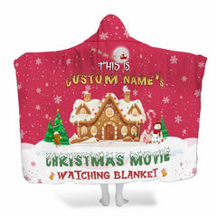 Holiday gingerbread cottage winter throw blanket with frosted cookie house and flying sleigh on red
