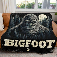 Folded cryptid throw blanket presentation highlighting the deep pine green and midnight blue tones