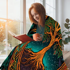 Tree of life bed cover displaying amber leaves, forest green foliage, and circular ribbon knotwork.
