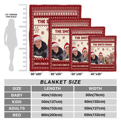 Folded holiday blanket highlighting red reindeer knit pattern