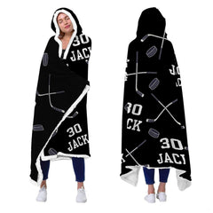 Sports bedding set design featuring crossed hockey sticks and varsity jersey numbers on black.
