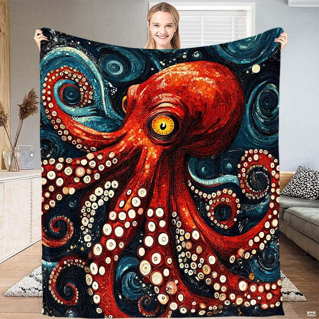 Artistic mosaic octopus nautical bed coverlets styled on a coastal bedroom display.