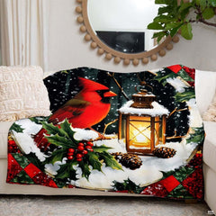 Top-thematic accent view of vibrant cardinal artwork surrounded by berries and festive evergreen wreath elements.