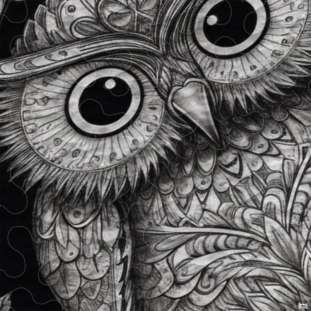 Detailed view of the monochrome owl artwork showing intricate mandala linework and etching.