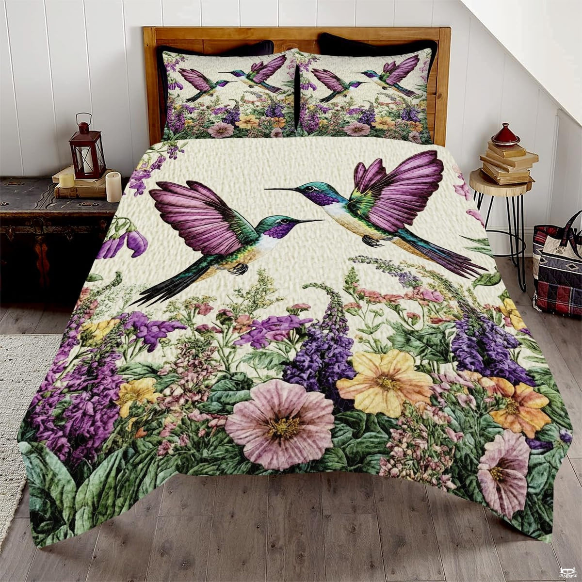 Two teal hummingbirds with lavender wings above a purple wildflower meadow