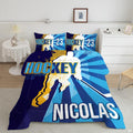 Ice hockey bedding featuring a skater silhouette and pop art sunburst rays on royal blue backdrop