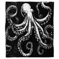 Monochrome black and white giant kraken octopus design on black.