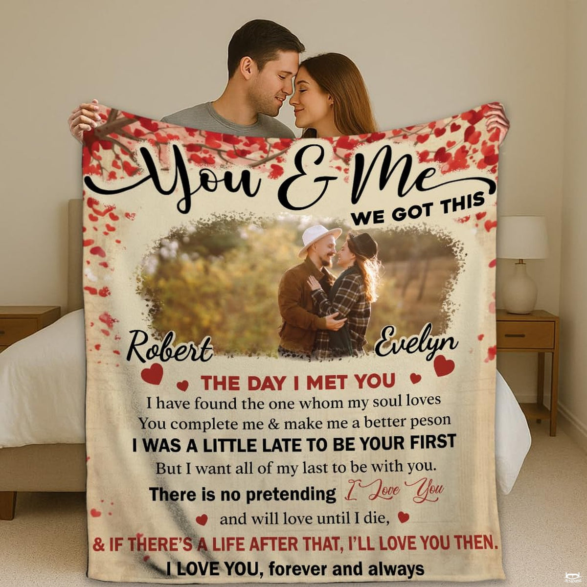 Romantic couple portrait framed by red rose petals and scattered heart motifs on thematic accent cream background.