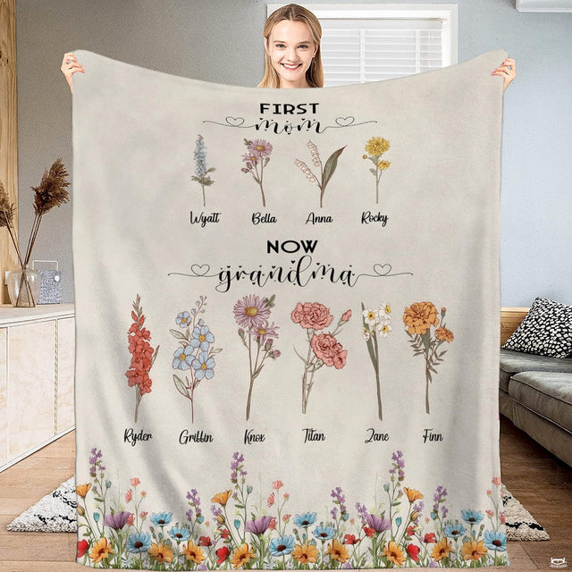 First Mom Now Grandma botanical floral throw blanket with tiered flower stems and lower meadow border on cream