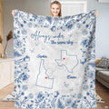 Blue botanical state map throw blanket featuring cobalt floral border and connected state outlines