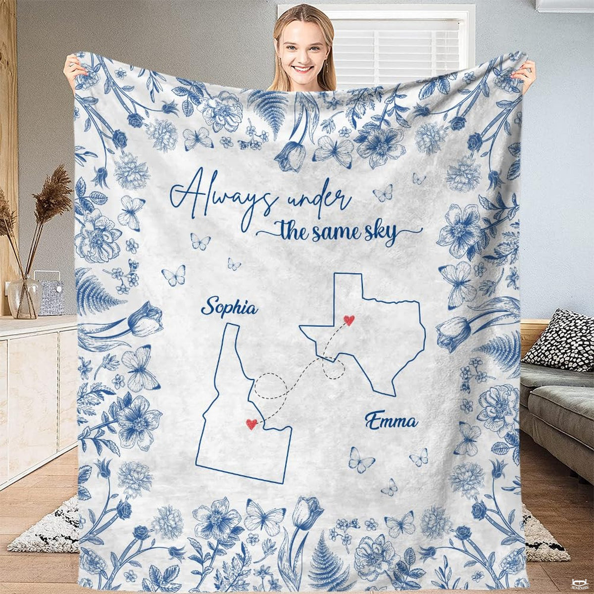 Blue botanical state map throw blanket featuring cobalt floral border and connected state outlines