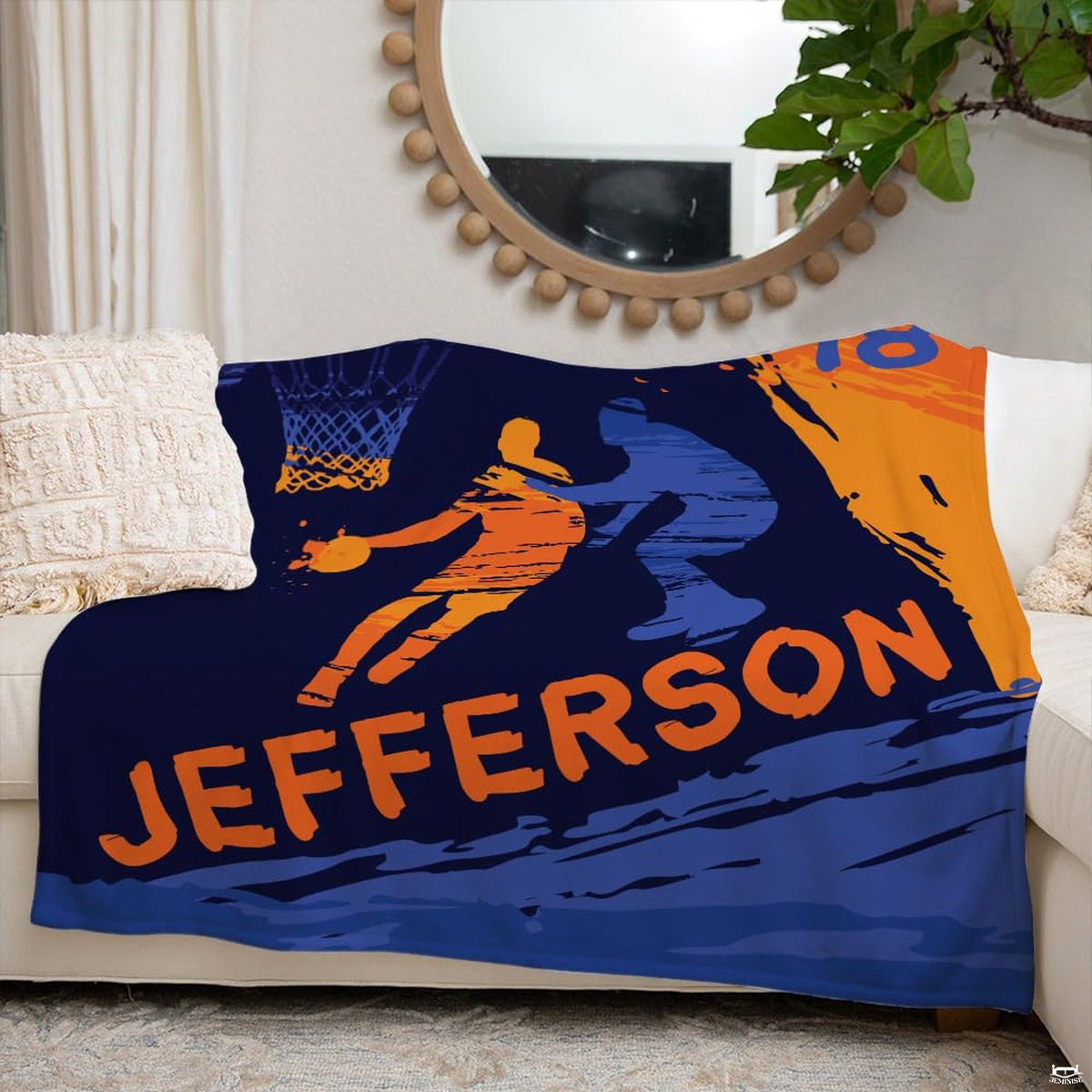 Artistic detail of textured paint splatters and athletic basketball motifs in royal blue and orange.