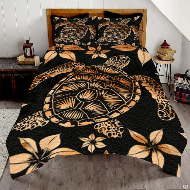 Batik sea turtle bedding set featuring Polynesian floral patterns in amber beige on deep black.