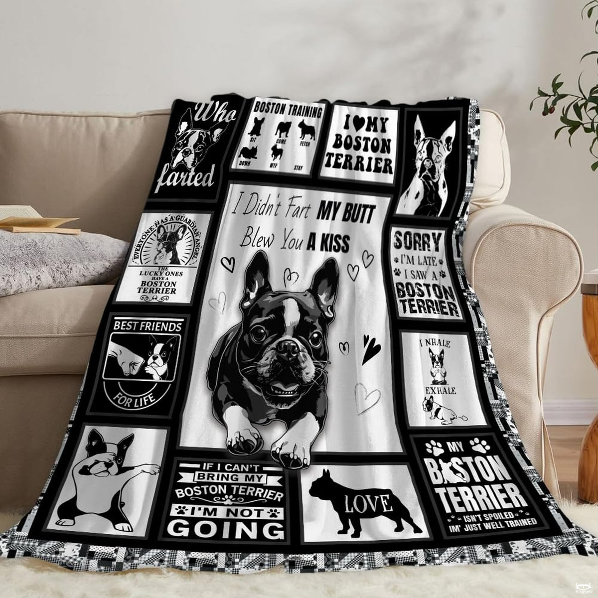 Decorated bedroom corner highlighting playful pet art motif and clean monochrome patchwork bedding.