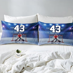 Side angle view of athletic winter sports bedding showing royal blue and scarlet red tones on mattress
