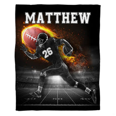 American football running back sprinting with ball under stadium lights, view 2.