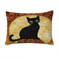 Close-up perspective of stylized black cat artwork with glowing moon and intricate rustic patchwork border accents.