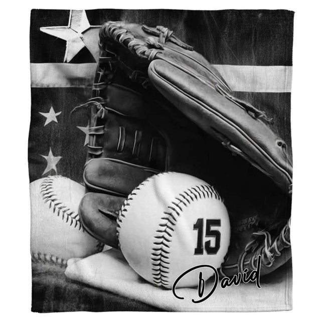Black and white baseball flag throw blanket featuring fielding mitt, baseballs, and American flag in monochrome