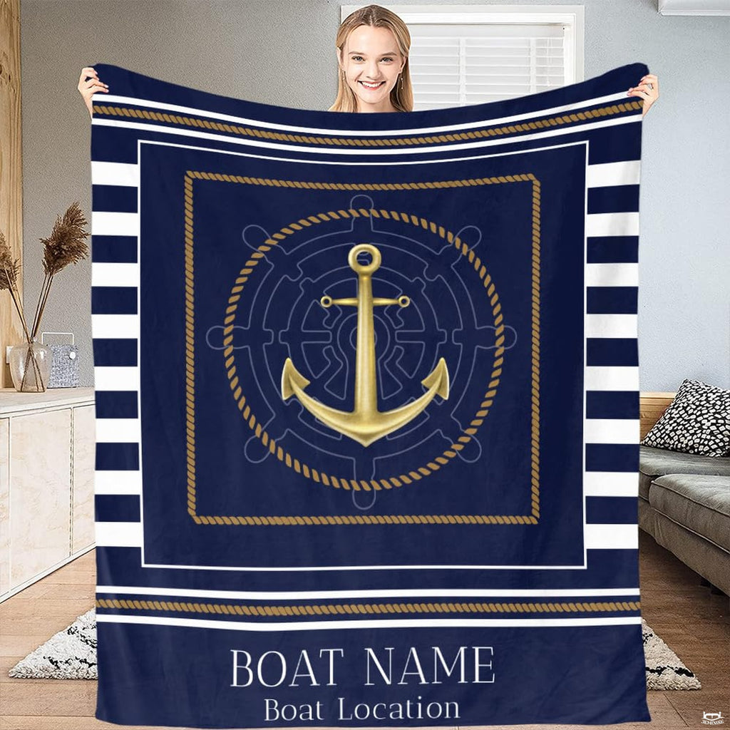 Nautical anchor and ship wheel graphic with golden tones on navy sailor stripes.