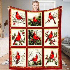 Winter red cardinals throw blanket featuring a nine-panel collage of songbirds, holly, and pine branches.