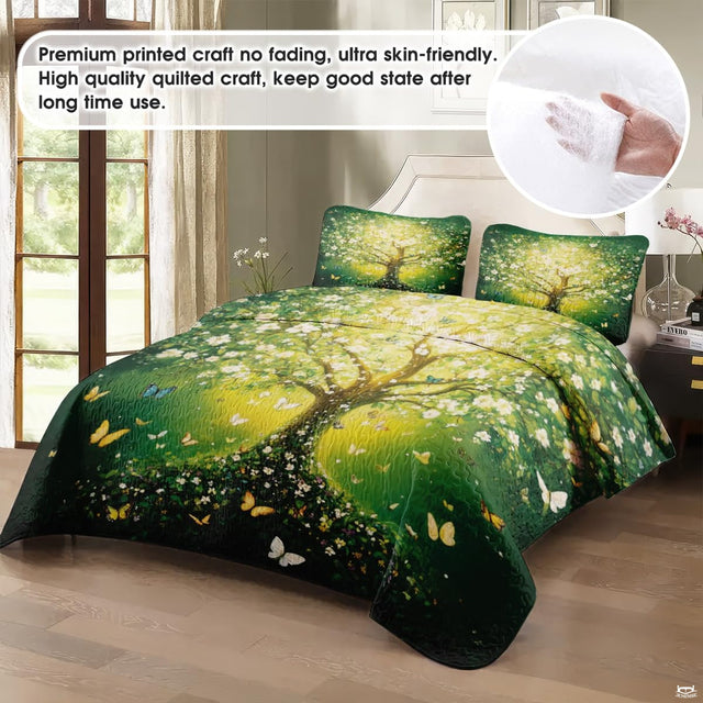 Close view of luminous golden undertones and blooming blossoms across tree of life bedding artwork.