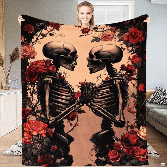 Gothic skeleton lovers holding hands surrounded by red roses on parchment background