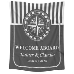 Nautical compass rose navy stripe throw blanket held open showing geometric seafaring artwork