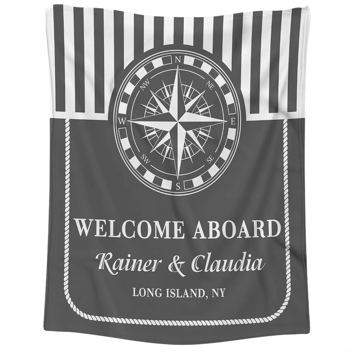 Nautical compass rose navy stripe throw blanket held open showing geometric seafaring artwork