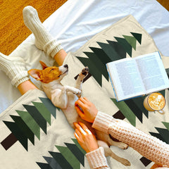 Close up shot showing detail of geometric pine trees and brown Sasquatch silhouette print.