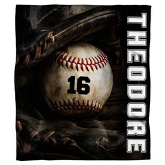 Baseball resting inside a dark fielder glove beside vertical white varsity lettering, view 1.
