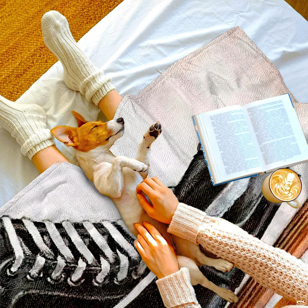 Close view of ice hockey skate blade and wooden stick blanket