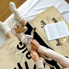 Overhead perspective of cream silhouette drape across reading lounger