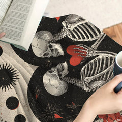 Top-thematic accent view of dark romantic bedding with blooming red poppies, botanical vines, and ornate heart silhouette.