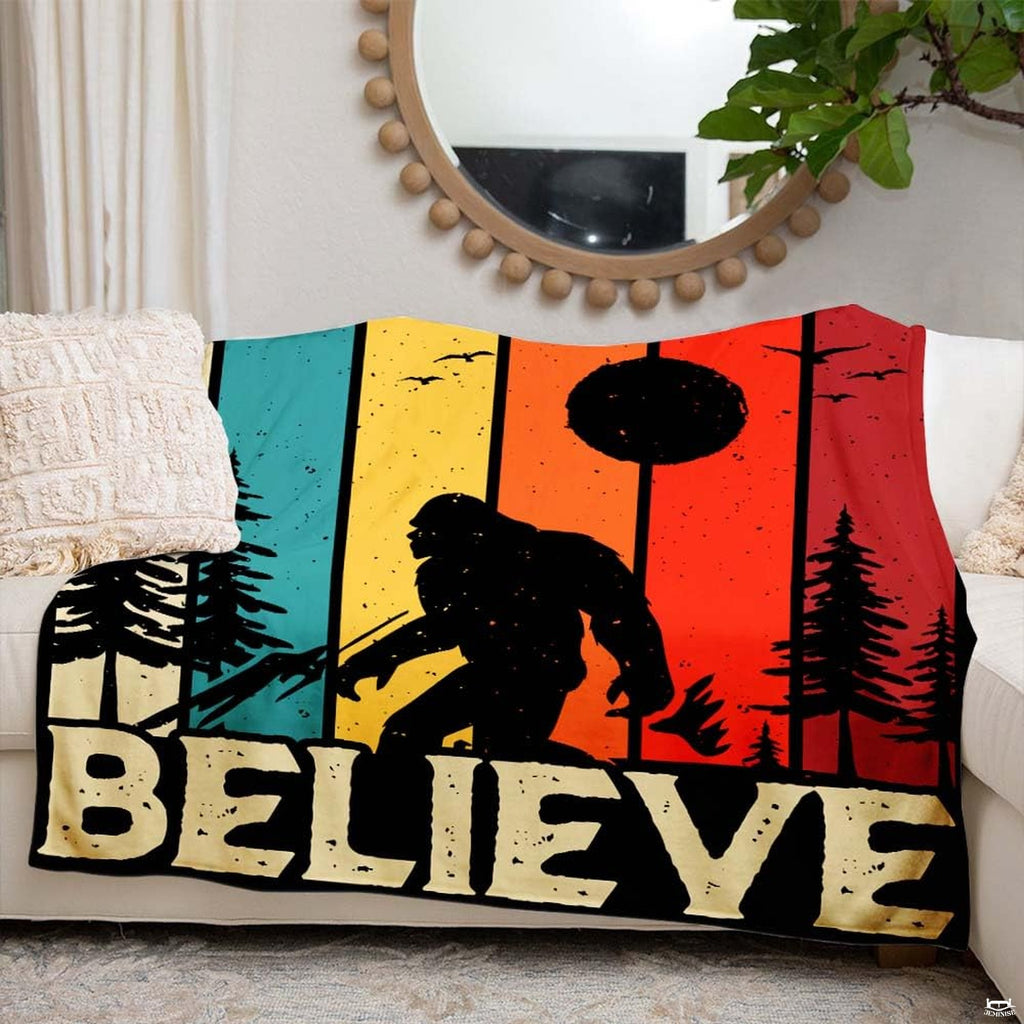 Retro sunset striped silhouette of Bigfoot walking in forest with believe text, view 4.