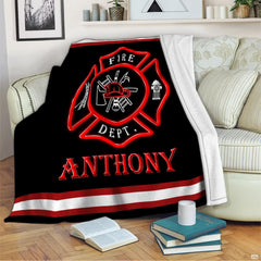 Firefighter Maltese cross emblem throw blanket styled over a contemporary living room sofa