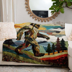 Folk art mosaic Bigfoot walking across rolling mountain foothills under a golden sun, view 6.