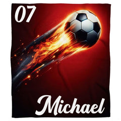 Flat perspective showing the blazing soccer ball graphic with athletic numbering and cursive name.