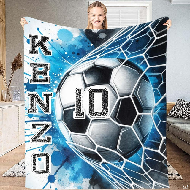 Soccer ball hitting goal net with blue watercolor paint splatter artwork for cottagecore bedding set decor.