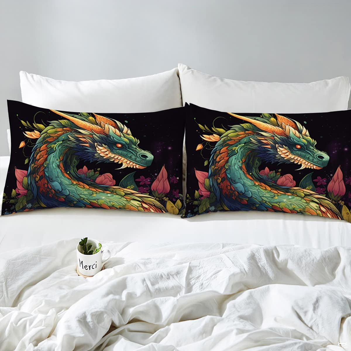 Overhead view of mythical floral dragon bedding styled elegantly across an interior bedroom bed arrangement