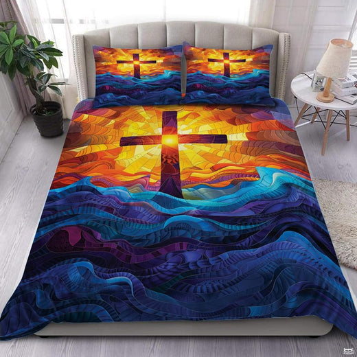 Radiant stained glass Christian cross scripture bedding set displayed neatly on a bed in an elegant bedroom