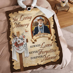 Sympathy cross throw blanket draped across a comfortable living room armchair