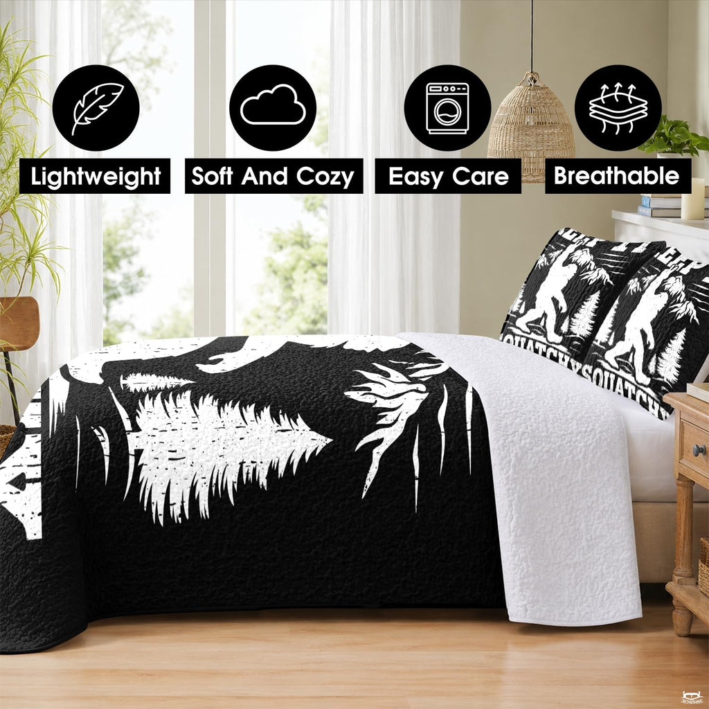 White block-style woodland Sasquatch art on deep black backdrop.